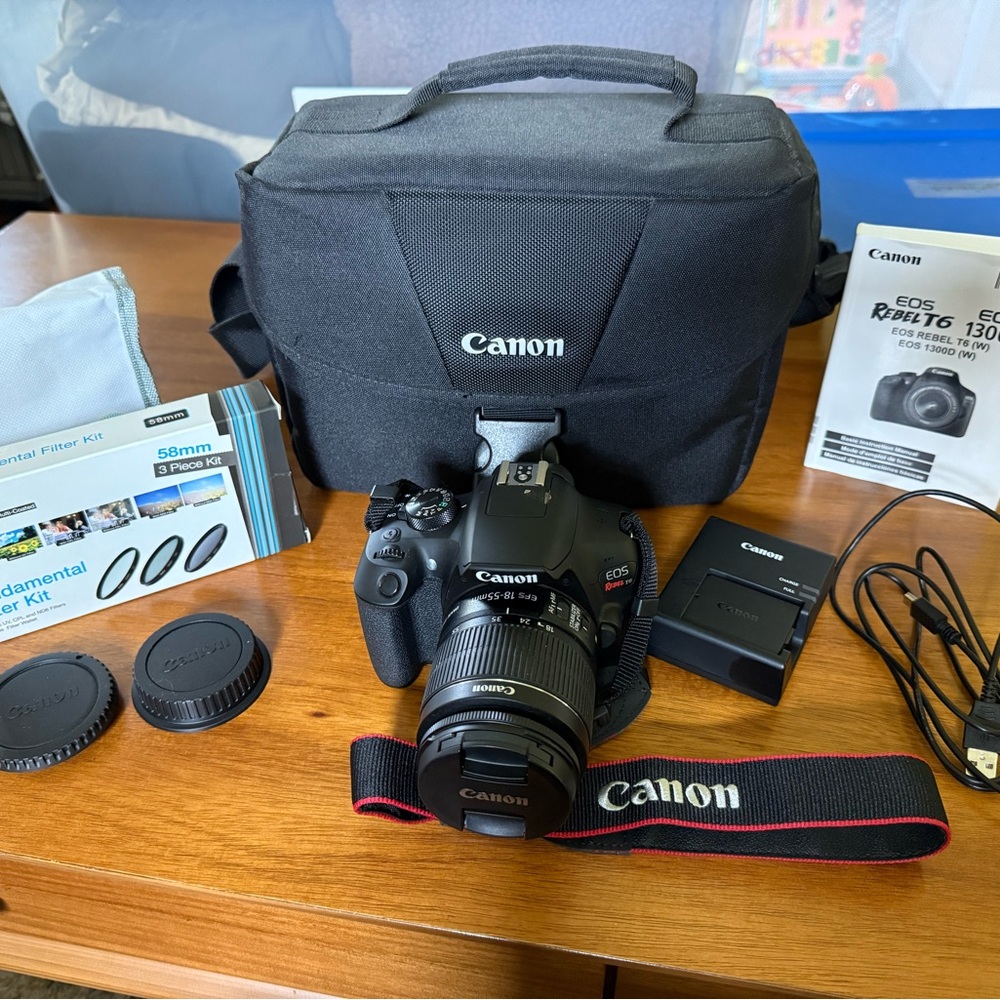 Canon EOS Rebel T6 DSLR Camera with Black and Red Accents